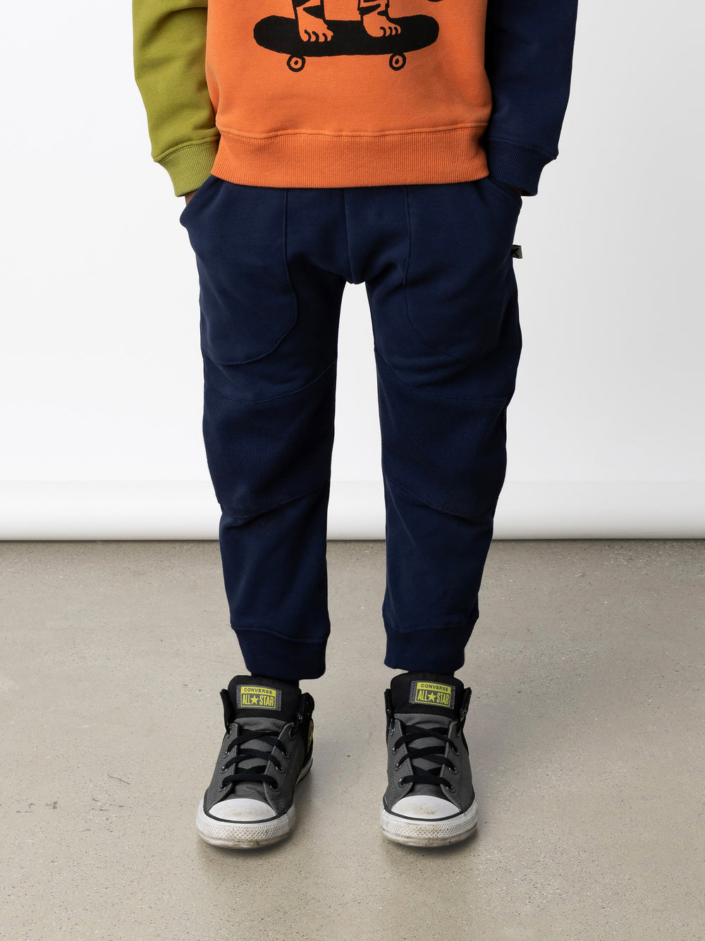 Minti kids clothing. Super cool baggy trackies featuring elastic waistband, front pockets, back pocket, 2x2 rib cuffs and reinforced 2x2 rib knee patches. Minti embroidery on the back pocket. 330 Gram // Brushed Inside // 95% Cotton // 5% Elastane.