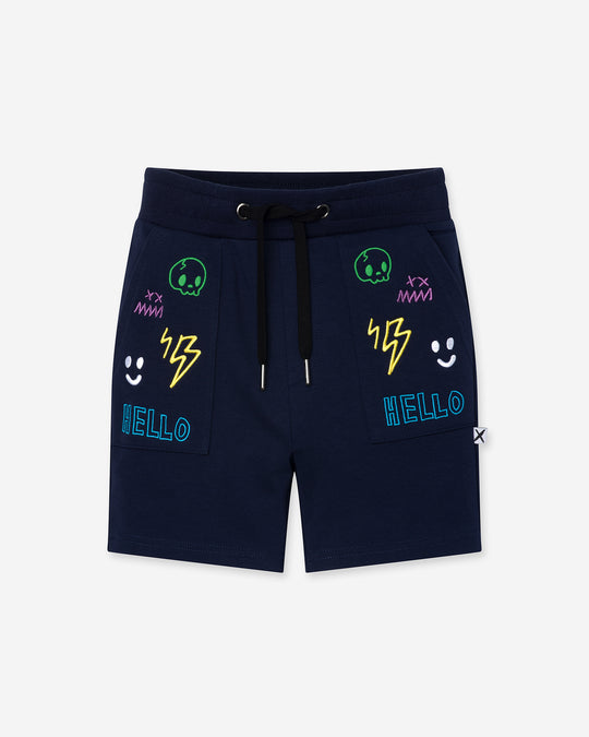 Badges Short in ink, boys shorts by Minti, flat lay