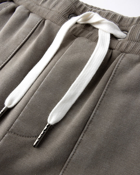 Close up detail of the Blasted Track Short in grey wash