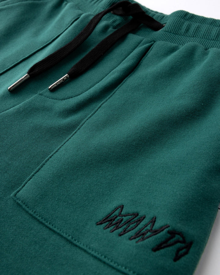 Close up detail of the Track Short in kelly green