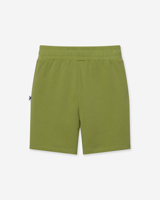 Track Short in lime, boys shorts by Minti, flat lay, back view