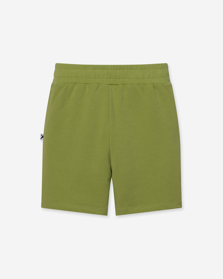 Track Short in lime, boys shorts by Minti, flat lay, back view