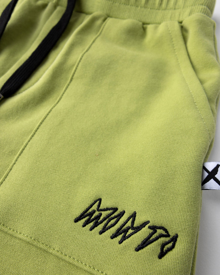 Close up detail of the Track Short in lime