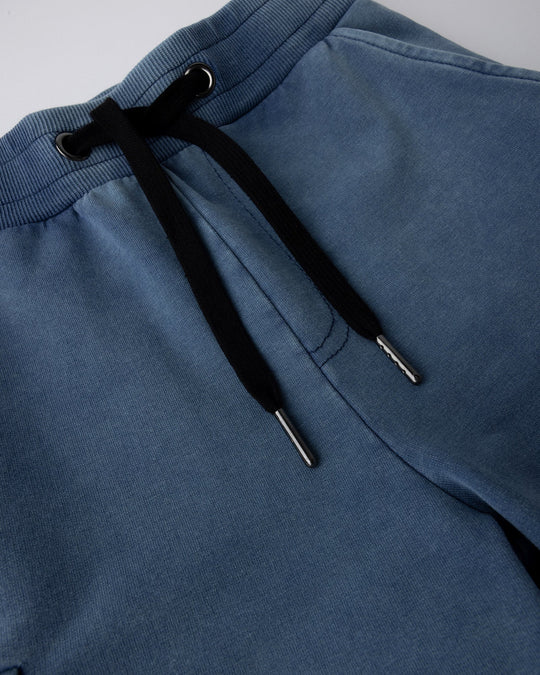 Close up detail of the Blasted Deluxe Cargo Short in midnight wash