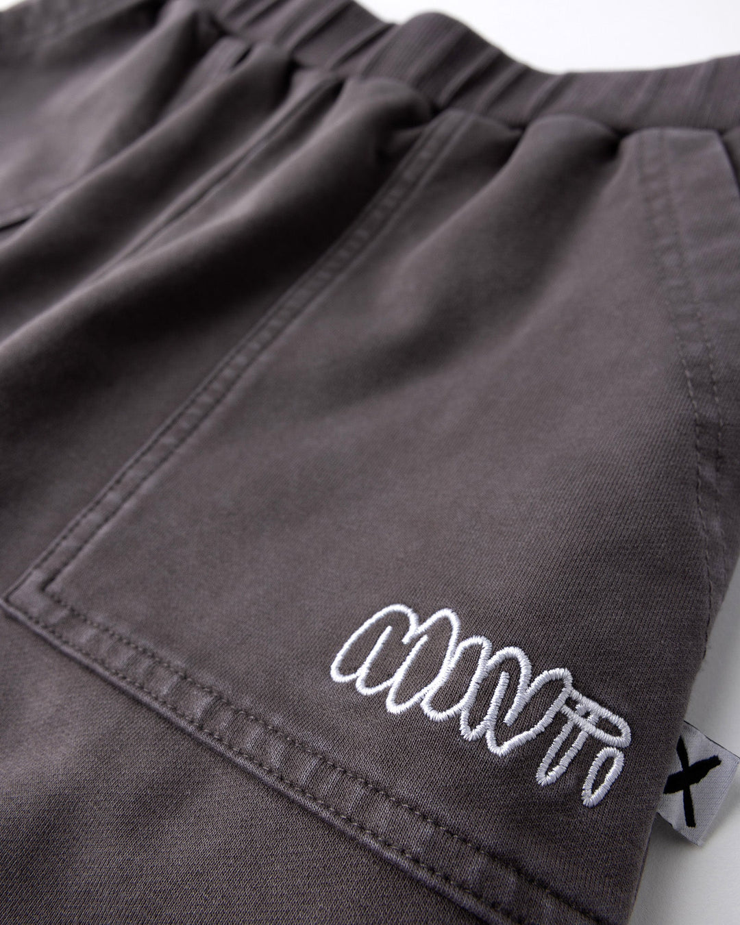 Close up detail of the Blasted Roller Short in black wash