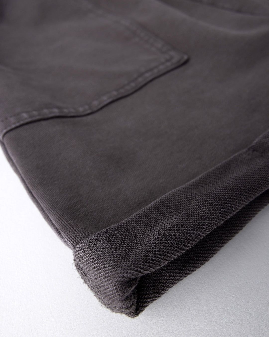 Close up detail of the Blasted Roller Short in black wash