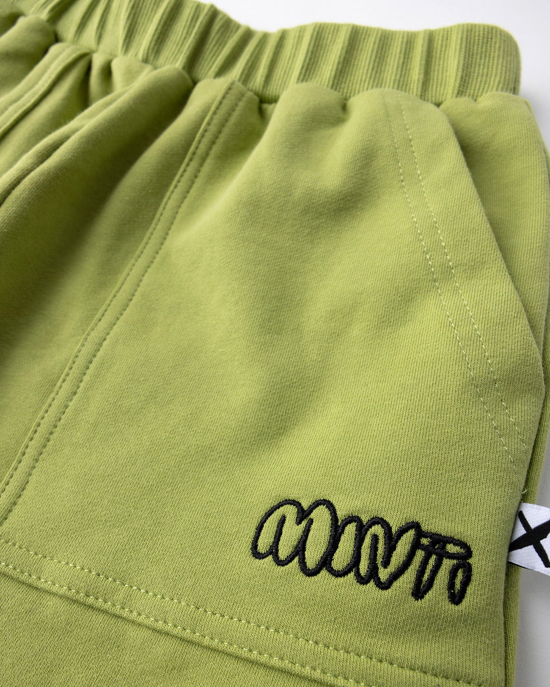 Close up detail of the Roller Short in lime