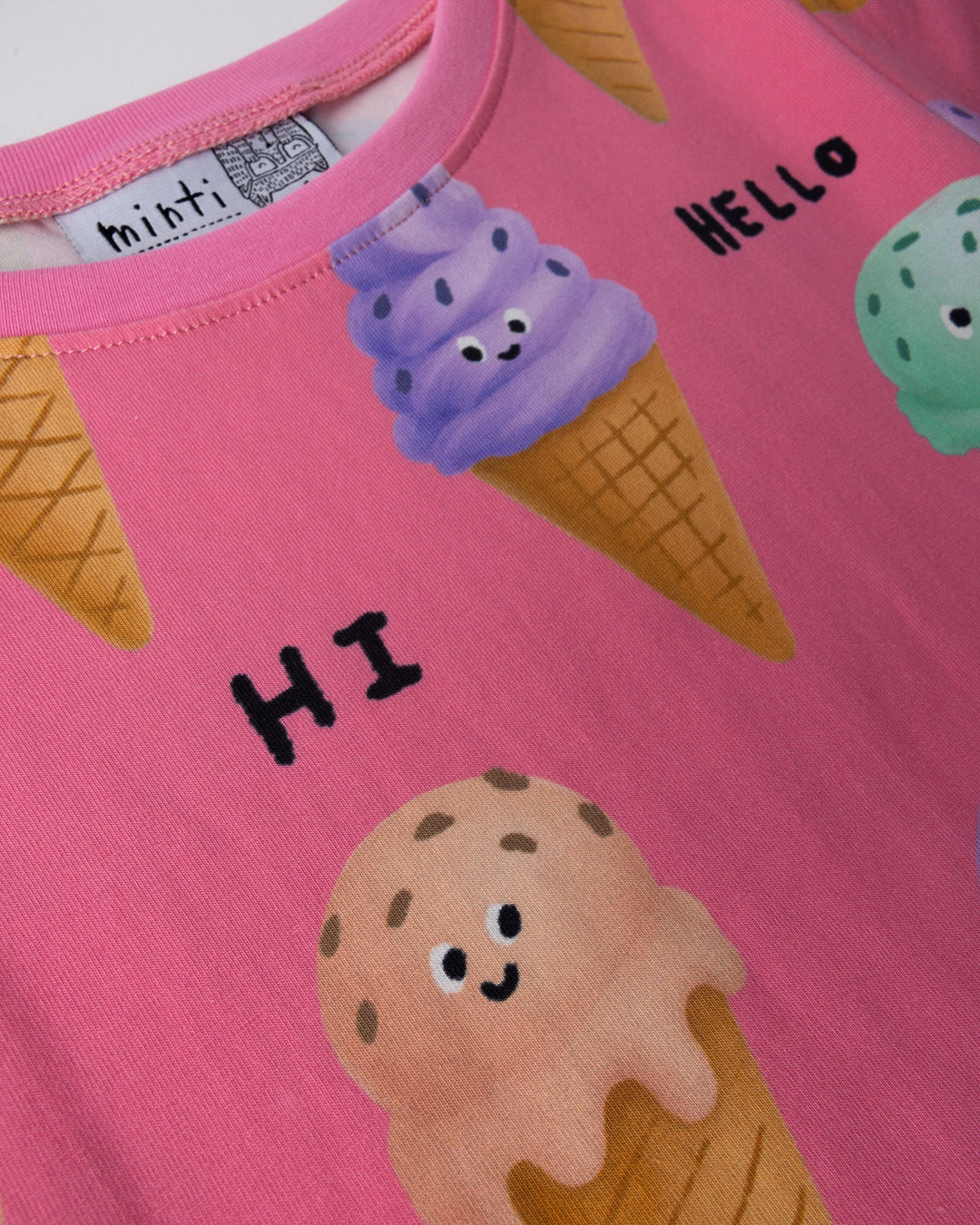 Close up of the Happy Icecreams Dress print in pink