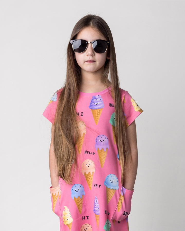Close up of the Happy Icecreams Dress in pink on a kid, front view