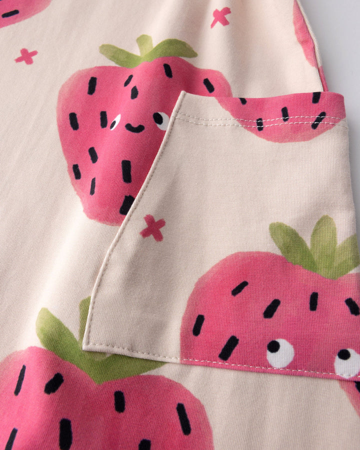 Close up detail of the Happy Strawberry Dress in cream