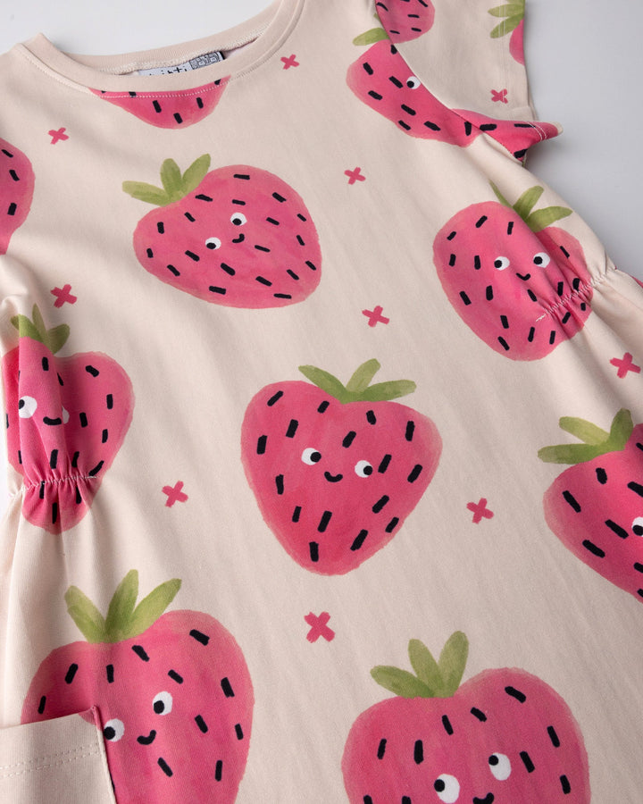 Close up of the Happy Strawberry Dress print in cream