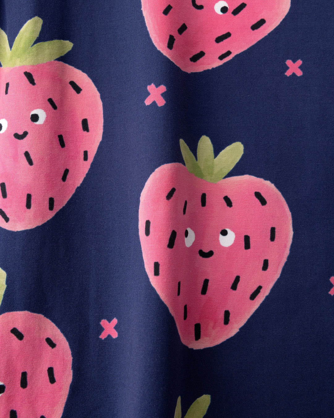Close up of the Happy Strawberry Dress print in turquoise