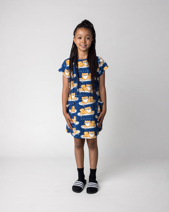 Kid wearing the Skate Puppy Dress in midnight, front view