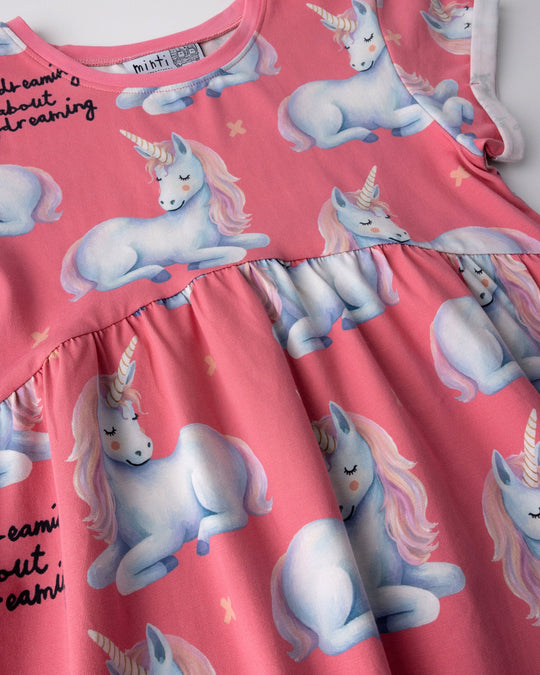 Close up of the Daydreaming Unicorn Dress print in candy