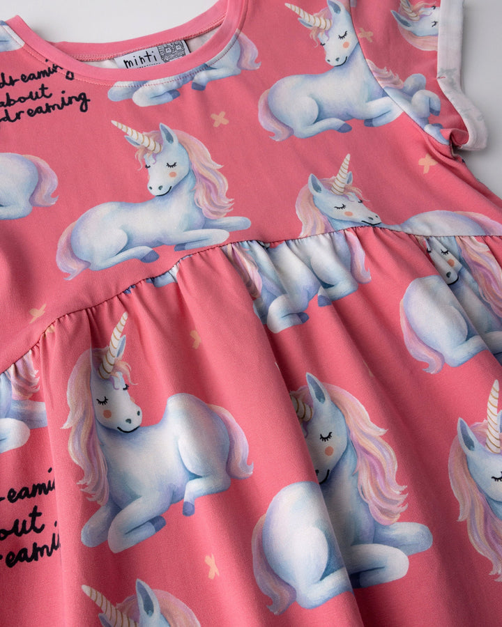 Close up of the Daydreaming Unicorn Dress print in candy