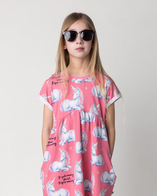 Close up of the Daydreaming Unicorn Dress in candy on a kid, front view