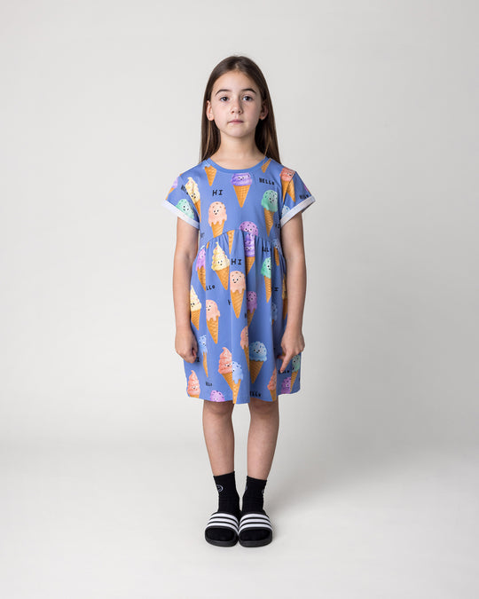 Kid wearing the Happy Icecreams Dress in cornflower, front view