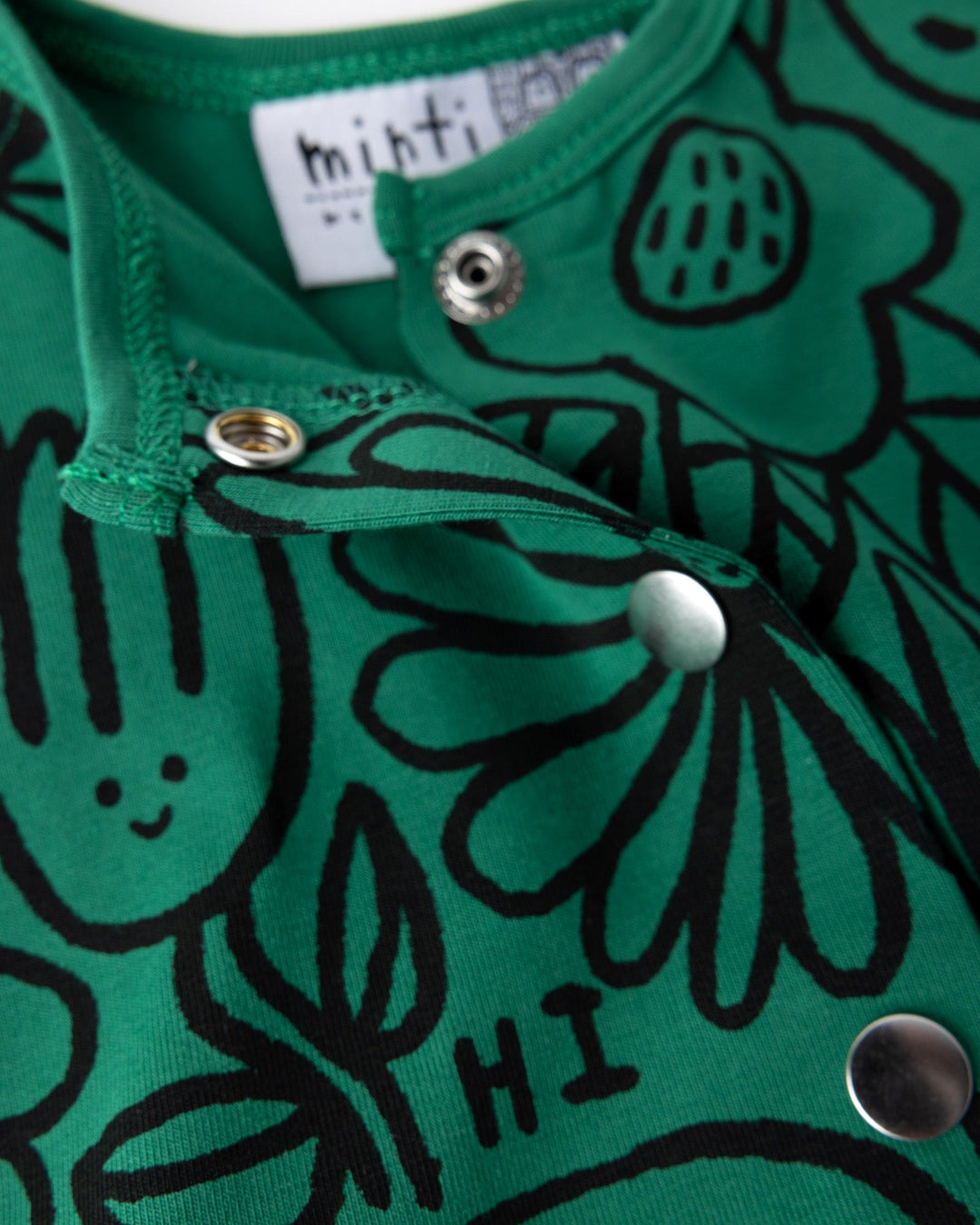 Close up detail of the Big Flowers Dress in kelly green