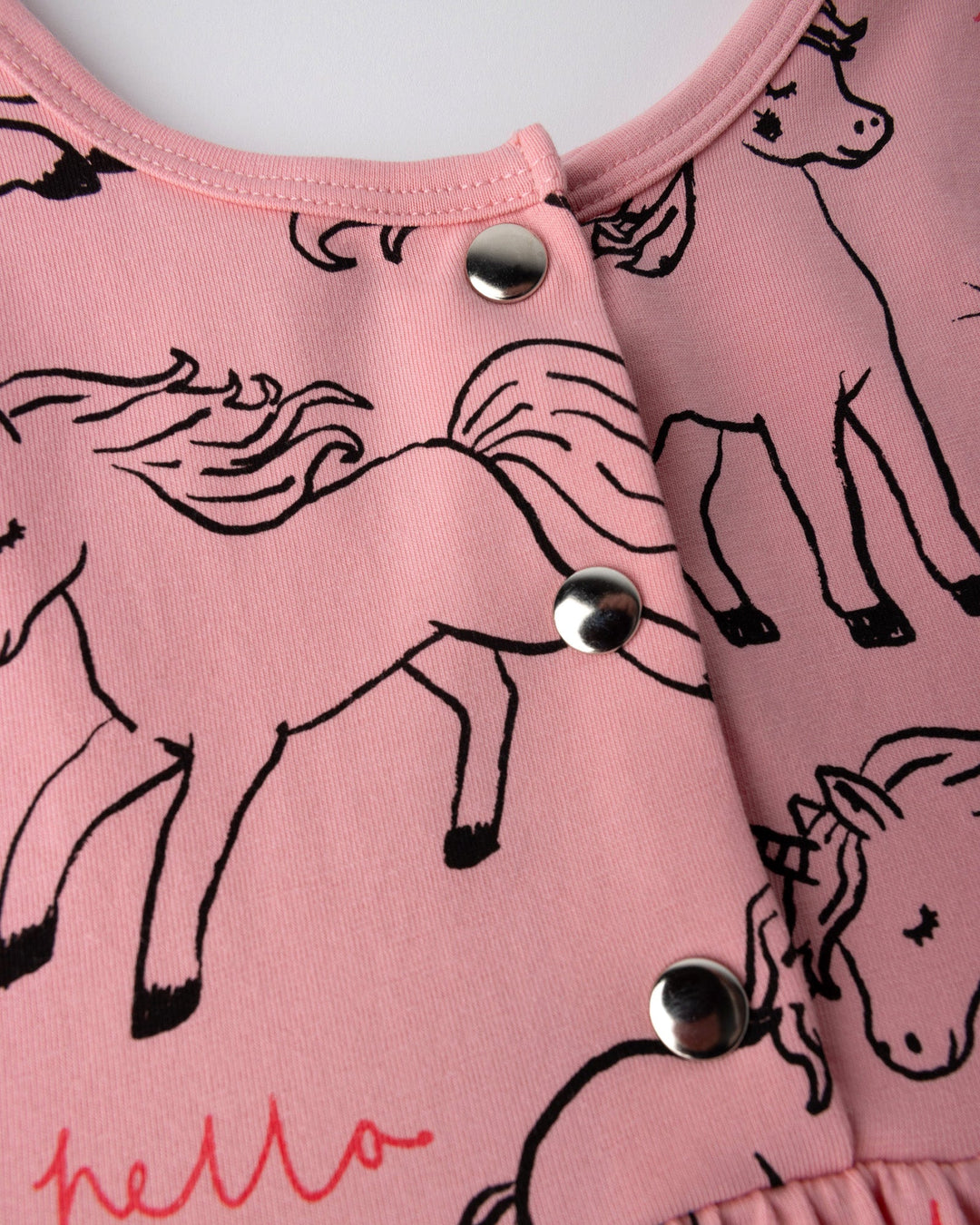 Close up detail of the Hello Unicorns Dress in pink