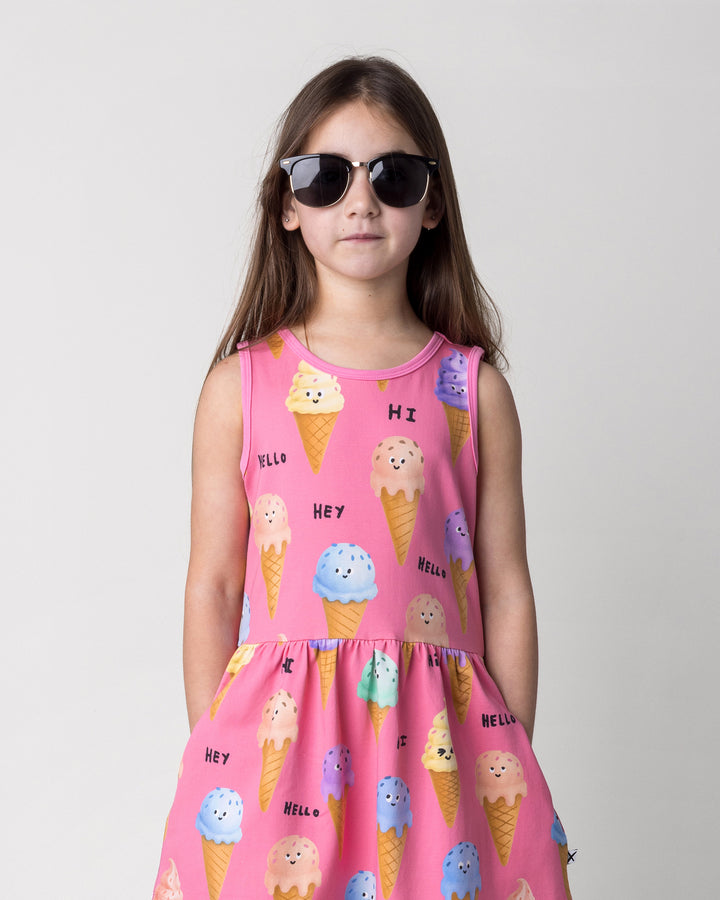 Close up of the Happy Icecreams Dress in pink on a kid, front view