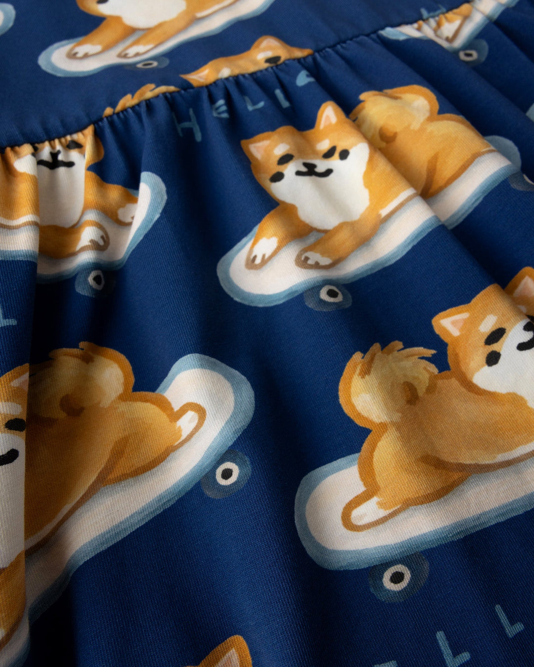 Close up of the Skate Puppy Dress print in midnight