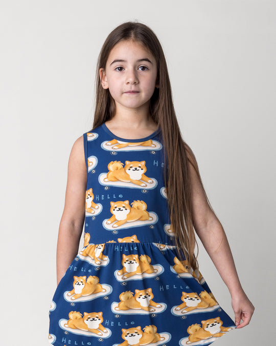 Close up of the Skate Puppy Dress in midnight on a kid, front view