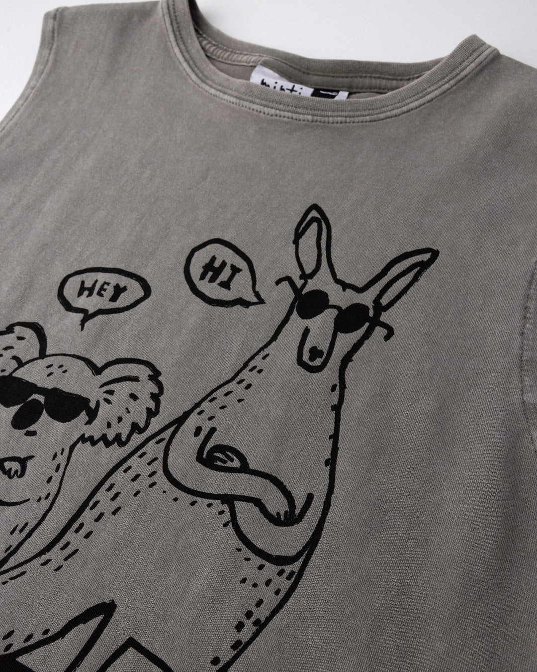 Close up of the Chill Mates Sleeveless Tee print in grey wash