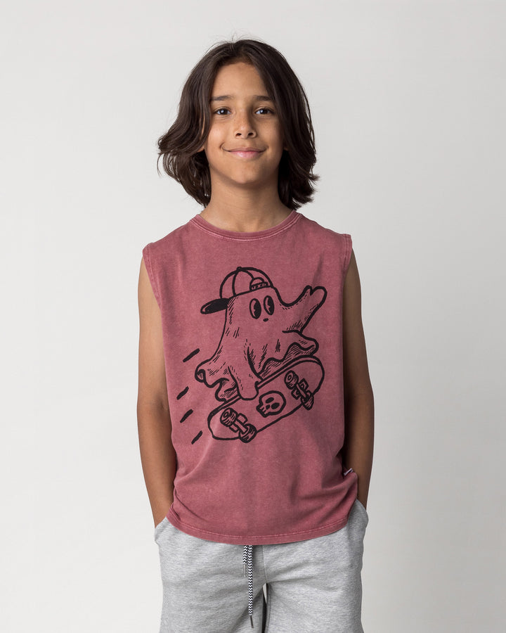 Close up of the Skate Ghost Sleeveless Tee in burnt red wash on a kid, front view