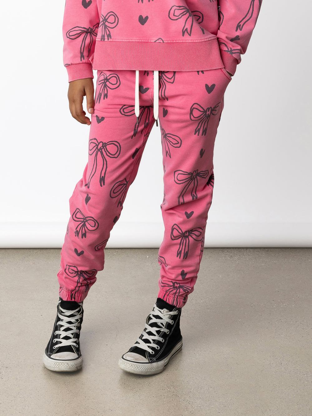 Minti kids clothing. Wider leg trackies with front pockets, shoelace cord, 2x2 rib elasticated waistband and gathered cuffs. 260 Gram // 95% Cotton // 5% Elastane.