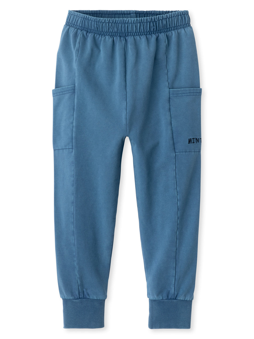 Minti kids clothing. Super cosy slip on trackies with elasticated waistband, drop crotch, super cool side pockets and 2x2 rib cuffs. 260 Gram // 95% Cotton // 5% Elastane.