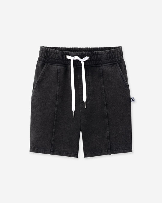 Blasted Panel Short in black wash, boys shorts by Minti, flat lay
