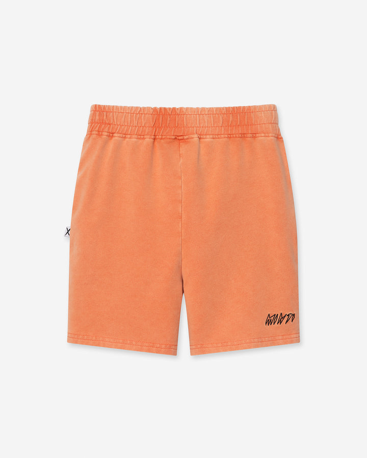 Blasted Panel Short in orange wash, boys shorts by Minti, flat lay