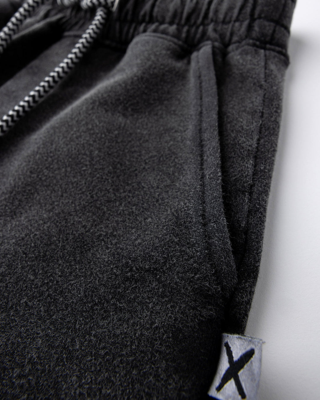 Close up detail of the Blasted Icon Short in black wash