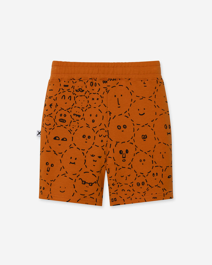 Different Faces Short in burnt orange, boys shorts by Minti, flat lay, back view
