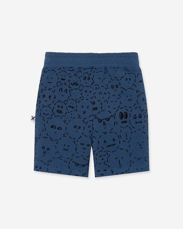 Different Faces Short in midnight, boys shorts by Minti, flat lay, back view