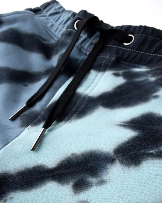 Close up detail of the Duo Tie Dye Short in blue and aqua