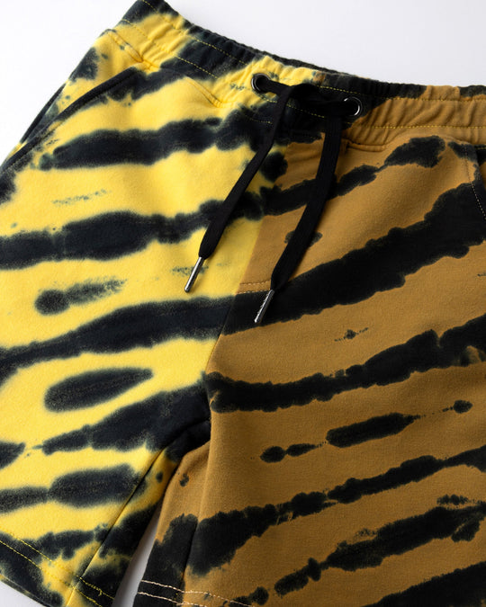 Close up detail of the Duo Tie Dye Short in lemon and rust