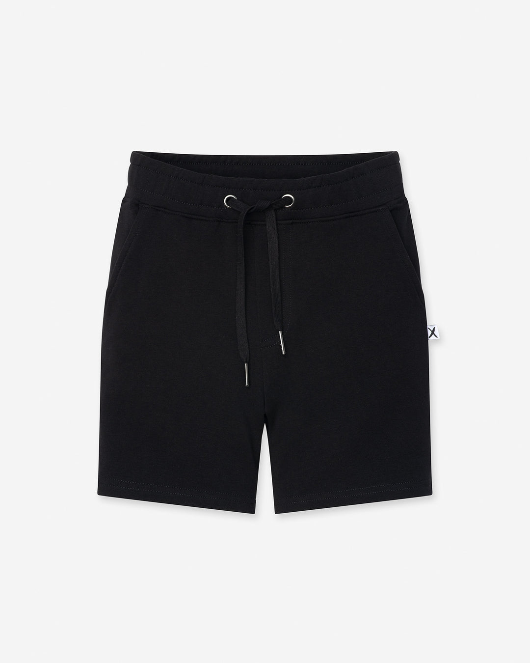 Hero Short in black, boys shorts by Minti, flat lay