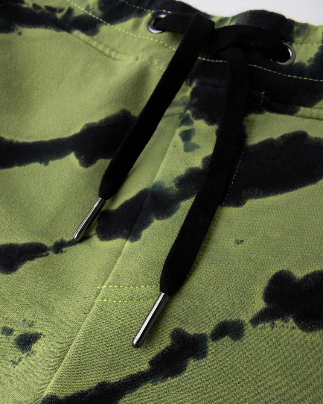 Close up detail of the Strike Short in lime