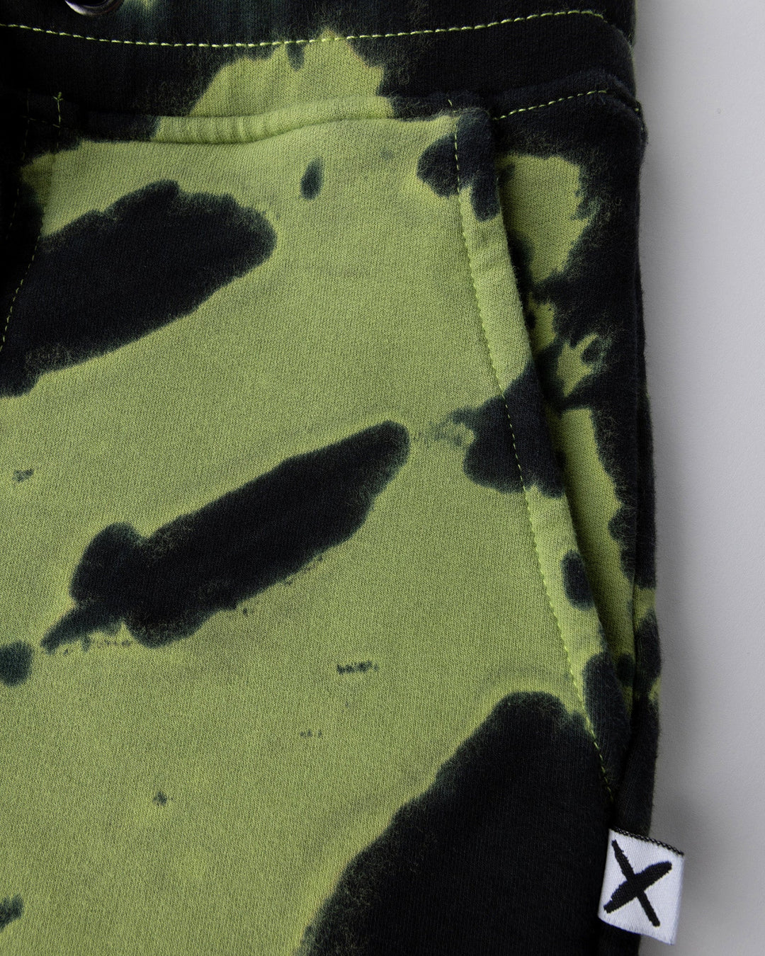 Close up detail of the Strike Short in lime