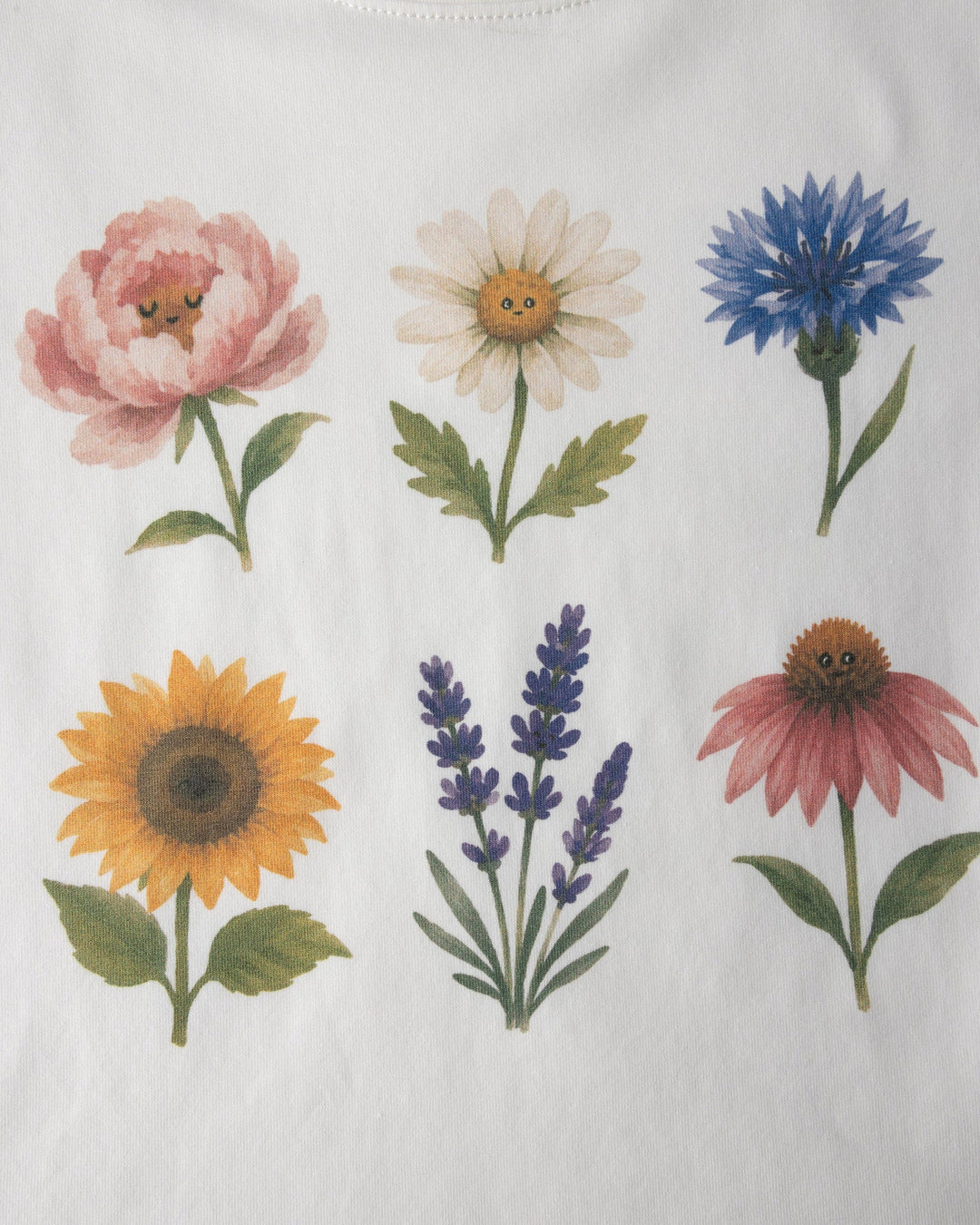 Close up of the Flower Friends Cropped Tee print in white