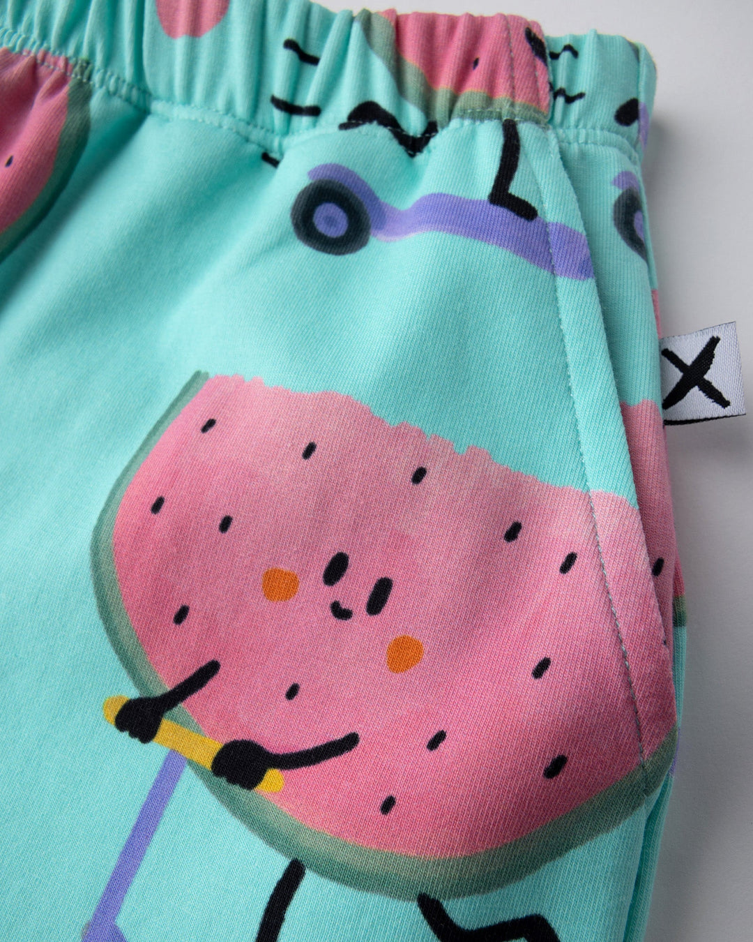 Close up of the Scooting Watermelon Short print in light mint