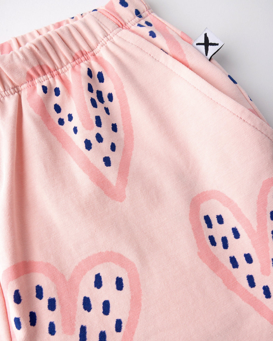 Close up detail of the Speckle Heart Short in pink