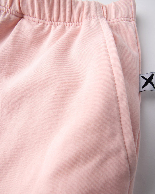 Close up detail of the Two Tone Short in pinks