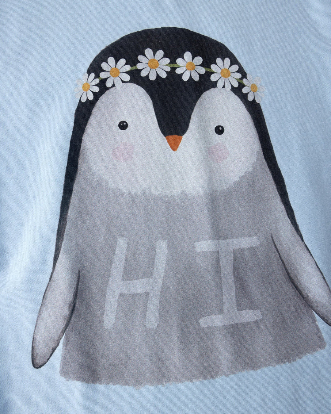 Close up of the Flower Penguin Tee print in light blue