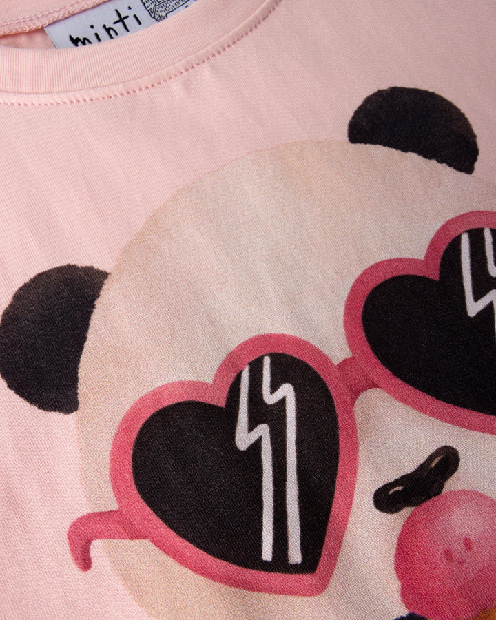 Close up of the Icecream Panda Tee print in light pink
