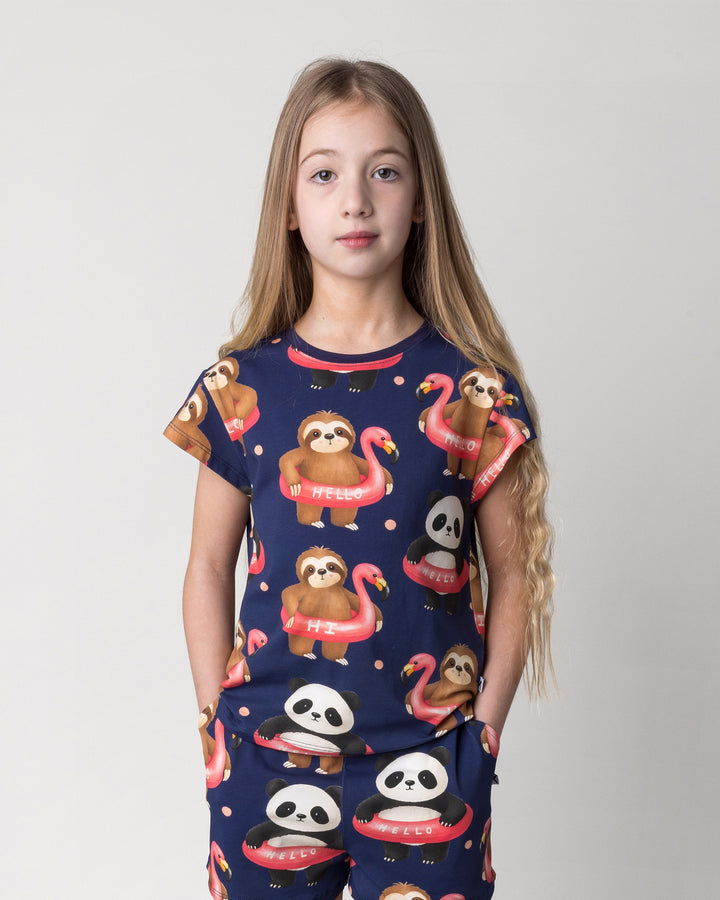 Close up of the Swimming Buddies Tee in midnight on a kid, front view