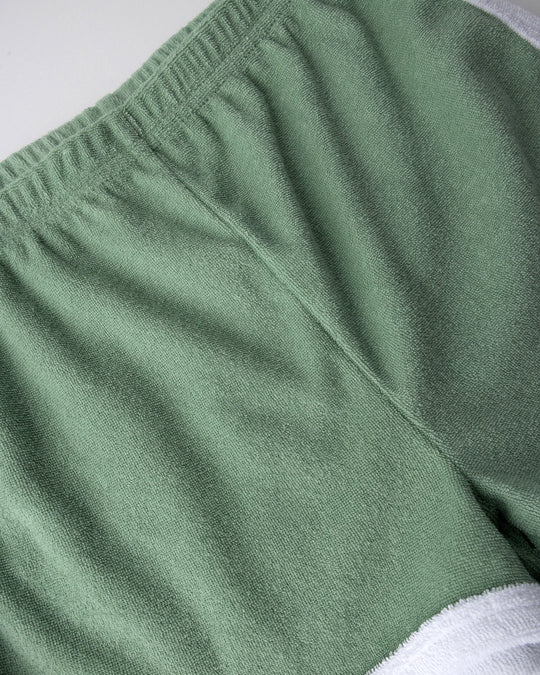 Close up detail of the Track Star Short in sage
