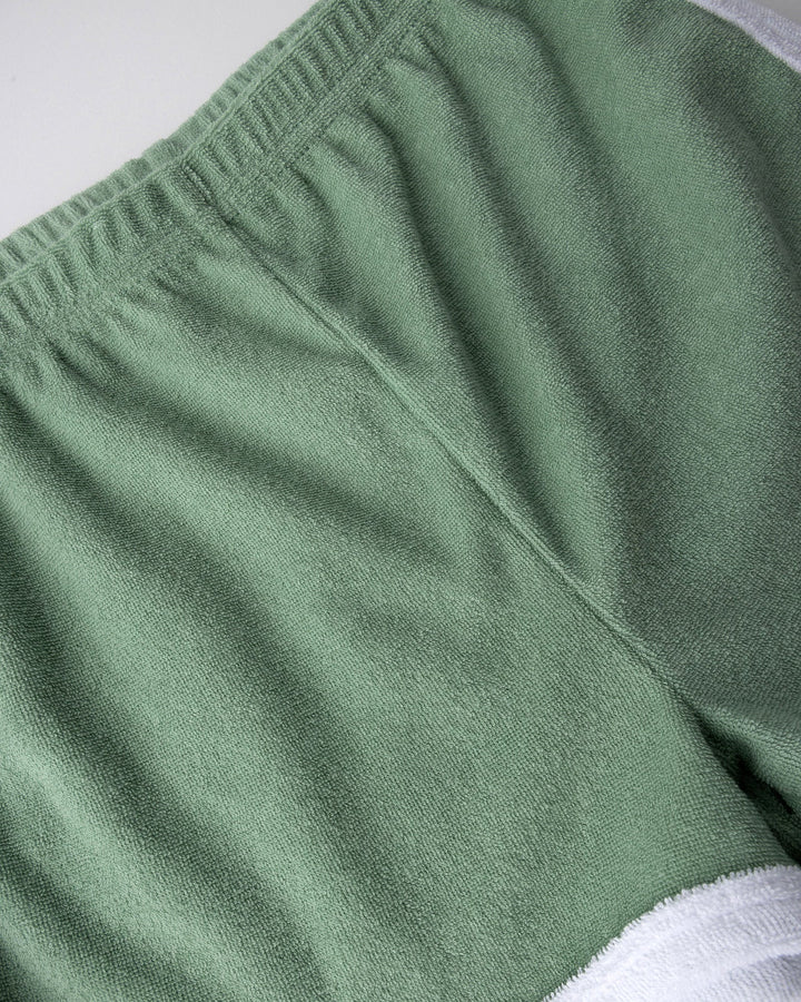 Close up detail of the Track Star Short in sage
