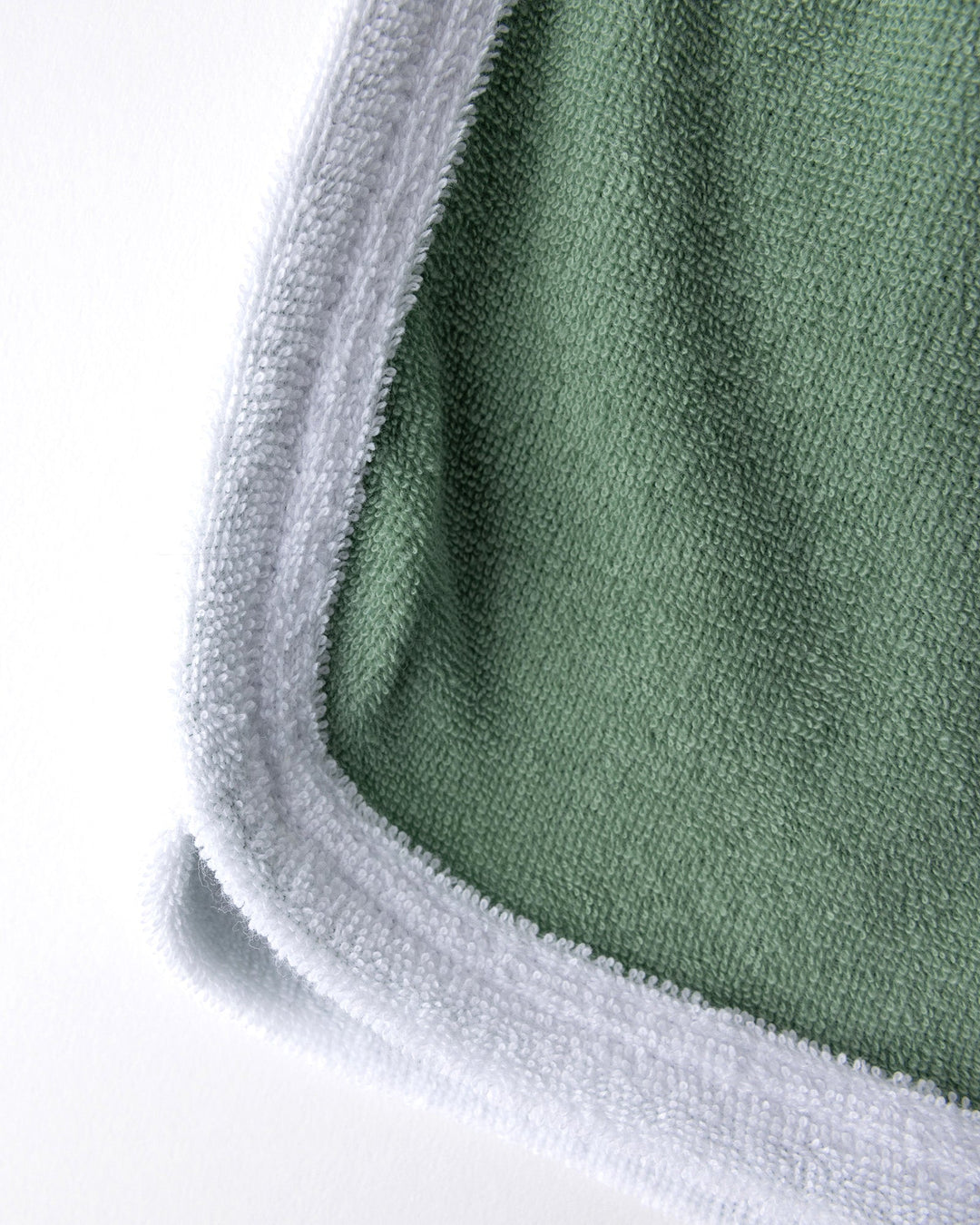 Close up detail of the Track Star Short in sage
